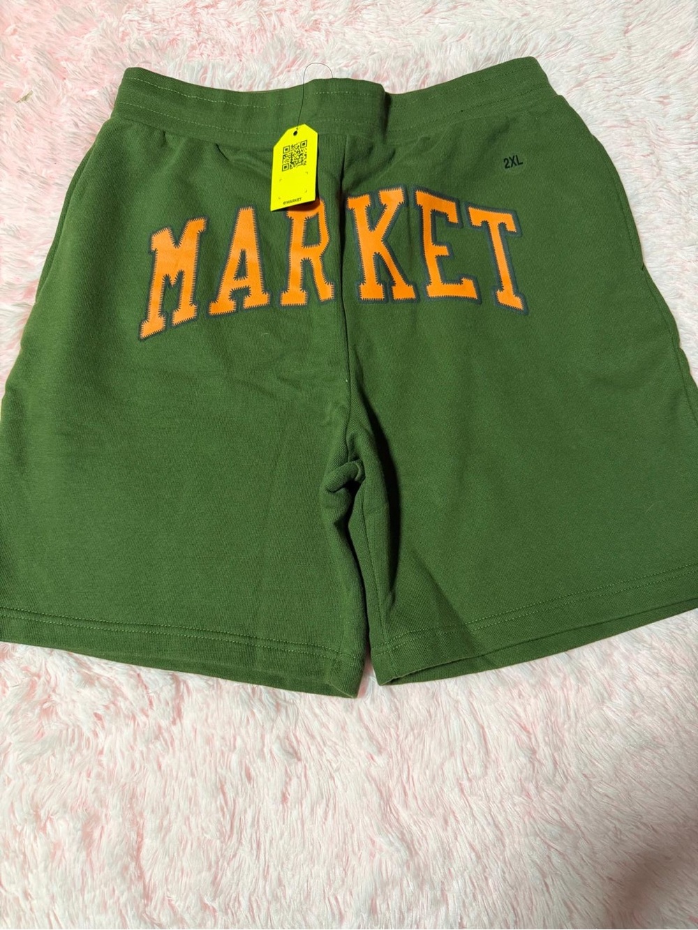 Olive Green Athletic Shorts with Orange 'MARKET' Lettering